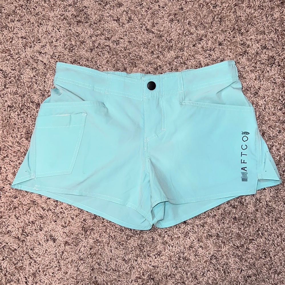 Brand new AFTCO fishing shorts - size 4